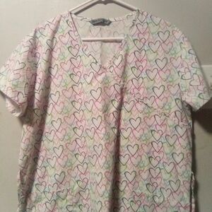 WEAR for care brand ladies short sleeve heart print scrub top. Size Large